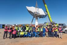 The construction team in front of the new dish.